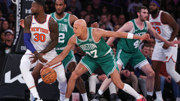 Boston Celtics guard Jordan Walsh (27) steals the ball from New York Knicks forward Julius Randle (30) during the first half at Madison Square Garden.